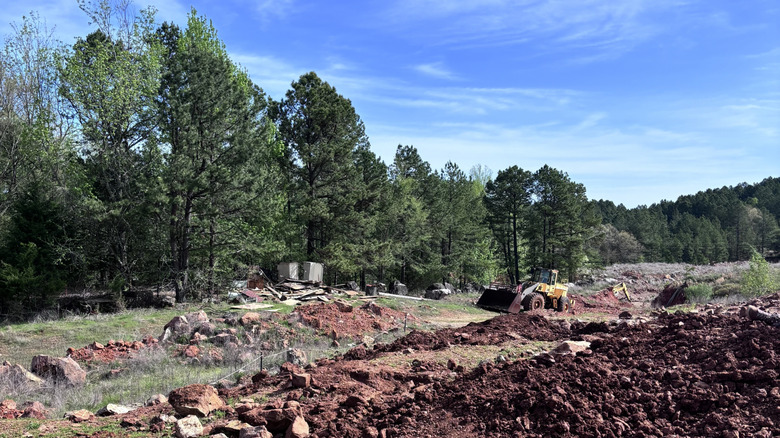 A backhoe opens quartz pockets at a public mine in Mount Ida, Arkansas.