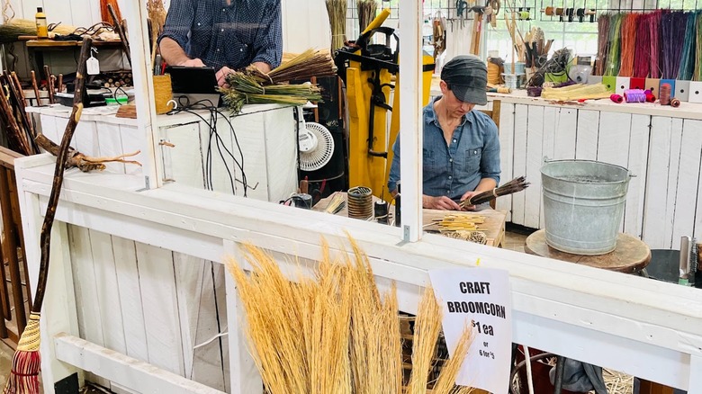 Two people during a broom-making demonstration at Ozark Folk Center State Park, Arkansas