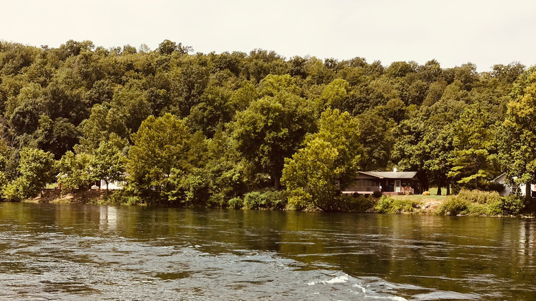 White River flows through cabins in Cotter, Arkansas