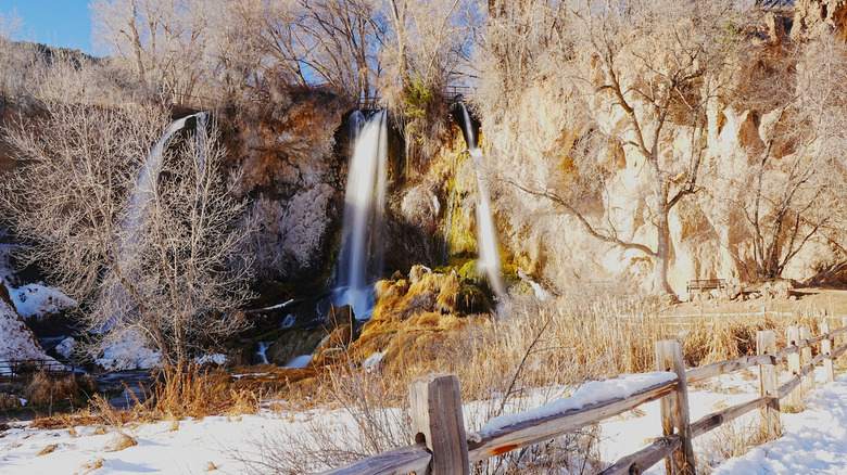 Trio of waterfalls cascades off a ridge at the Rifle Falls State Park, Colorado