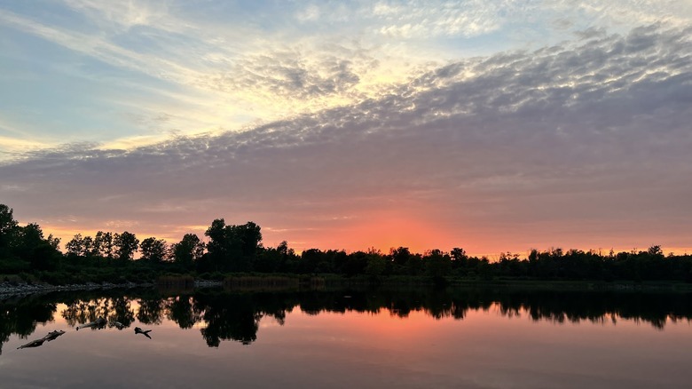 The sun sitting low in the sky over Possum Creek MetroPark in Dayton, Ohio