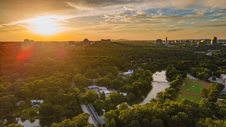 drone shot over Vinings Atlanta neighborhood with greenery and river