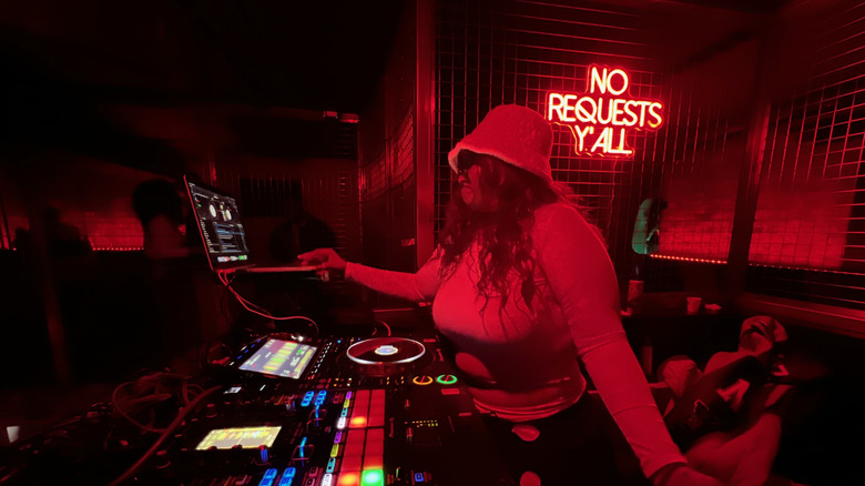 A DJ performs at MJQ Concourse at the Atlanta Underground.