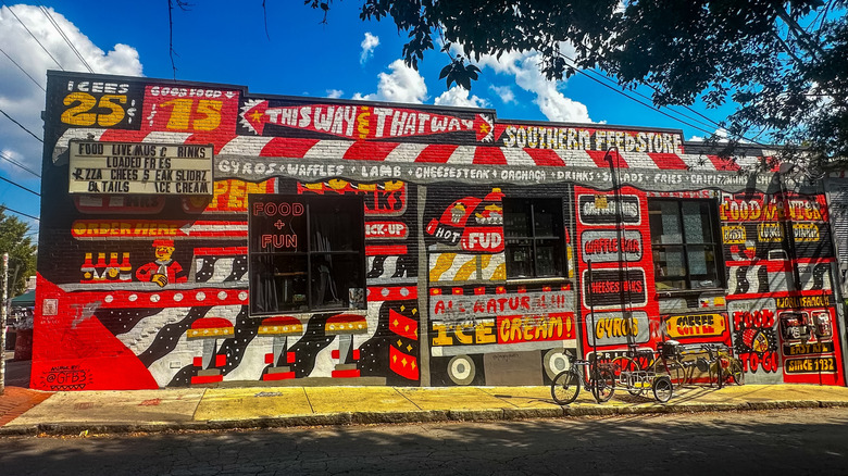 A mural on the exterior of the Southern Feed Store in East Atlanta Village, Georgia