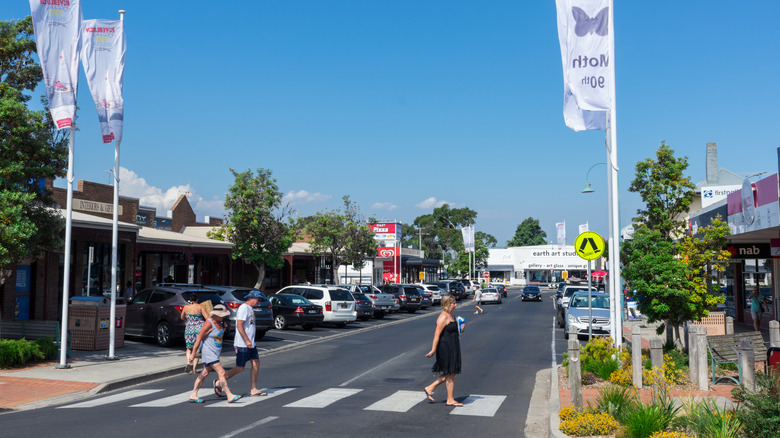 People walking down Abeckett Street in downtown Inveroch, Australia