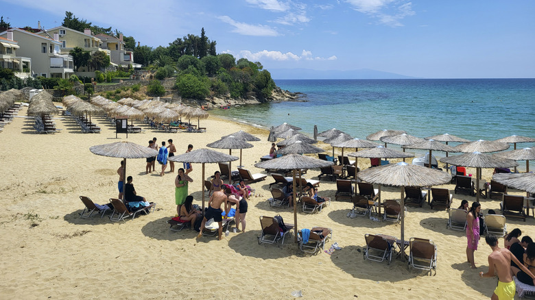 Sunbeds and sun umbrellas on a Greek beach