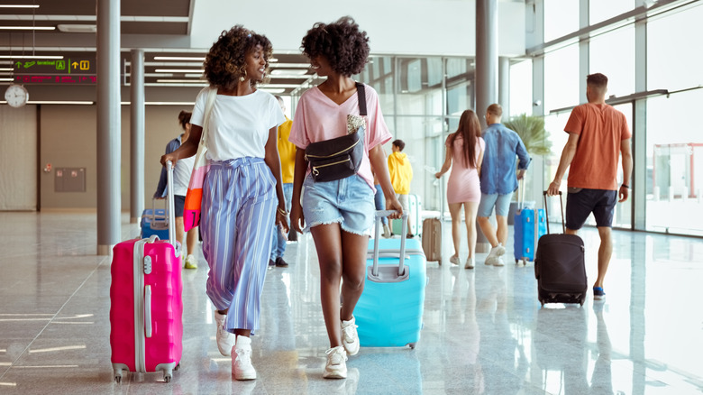 Women walking around airport