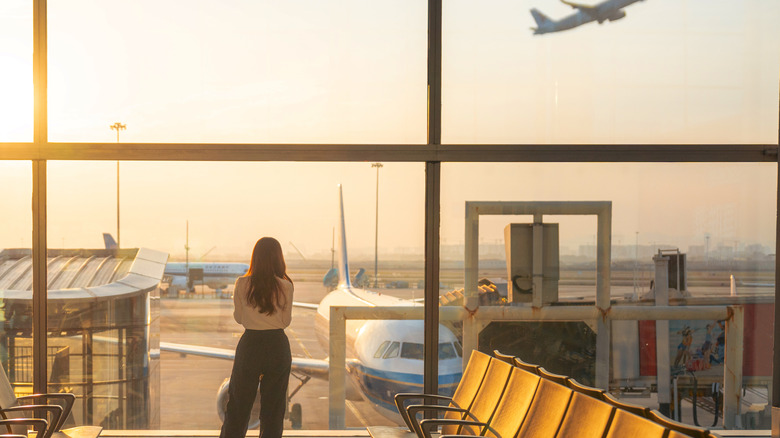 Woman waits for a flight