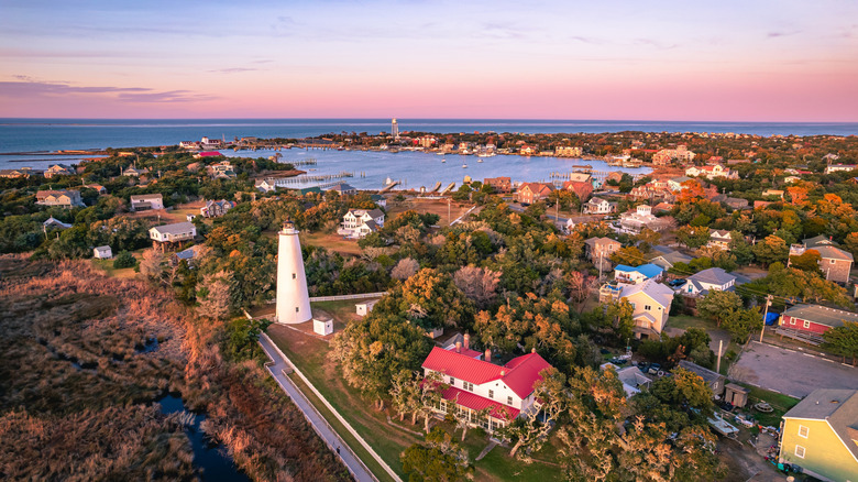 An aerial view of the Ocracoke Lighthouse and village at sunset