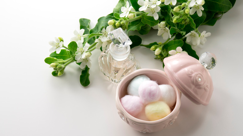cotton balls perfume bottle