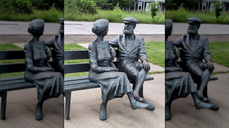 Statue of Alexander Graham Bell, and wife Mabel, on a bench on the Baddeck Boardwalk