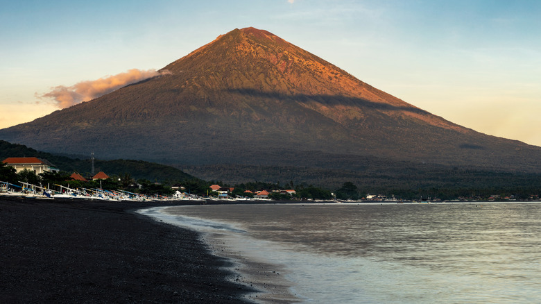 Black sand beach and Mount Agung