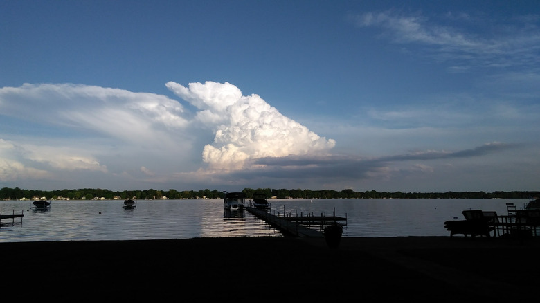 Bass Lake with a large cloud looming in the sky