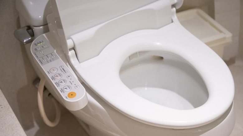 High-tech flush with buttons panel