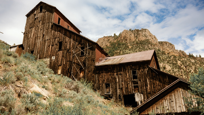 Wooden multi-story mill and mountain Bayhorse, Idaho