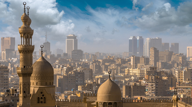 Skyline behind mosque minaret in Cairo, Egypt