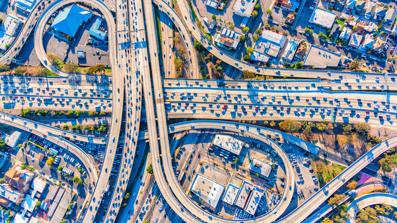 The interchange between the 110 freeway and the Interstate 10 in downtown Los Angeles, California during rush hour on a spring afternoon shot via helicopter from an altitude of about 1100 feet