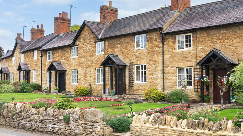 Row of stone cottages line Bedfordshire street