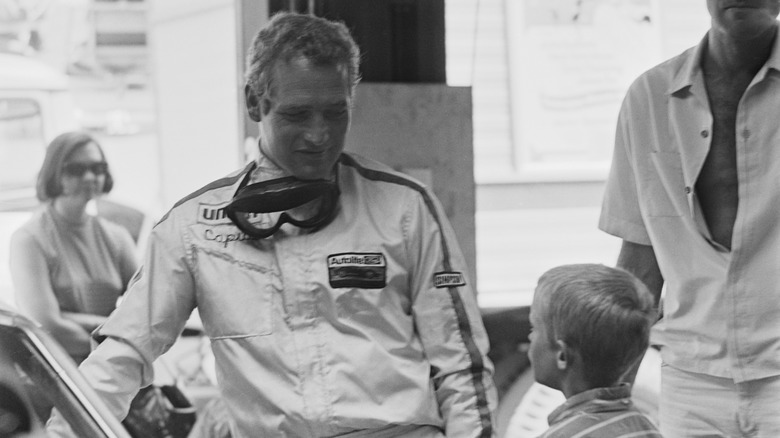 Actor Paul Newman in a racing suit for 'Winning' filming at Riverside International Raceway