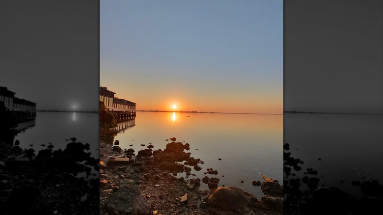 A sunset view from the private beach at the Current Hotel