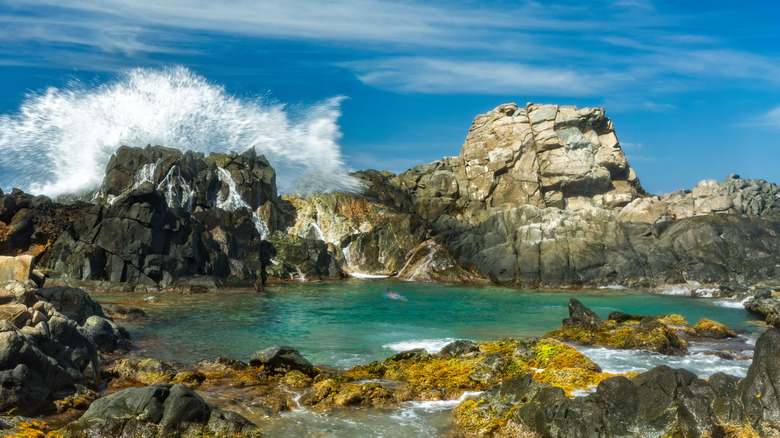 waves crashing at Arikok National Park