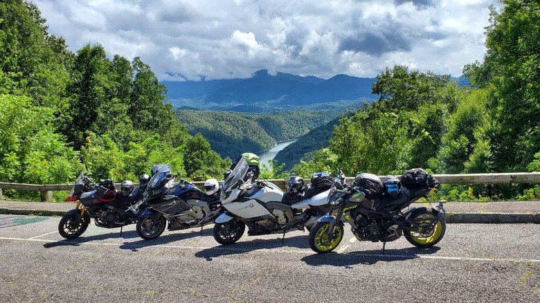 Four motorcycles parked overlooking the Fontana Lake Overlook on Lakeview Road in Great Smoky Mountains National Park