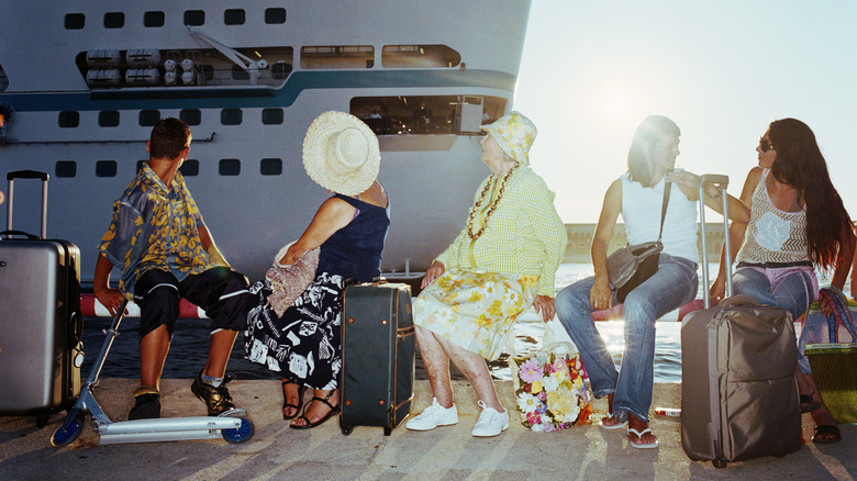 Passengers waiting to embark on a cruise ship