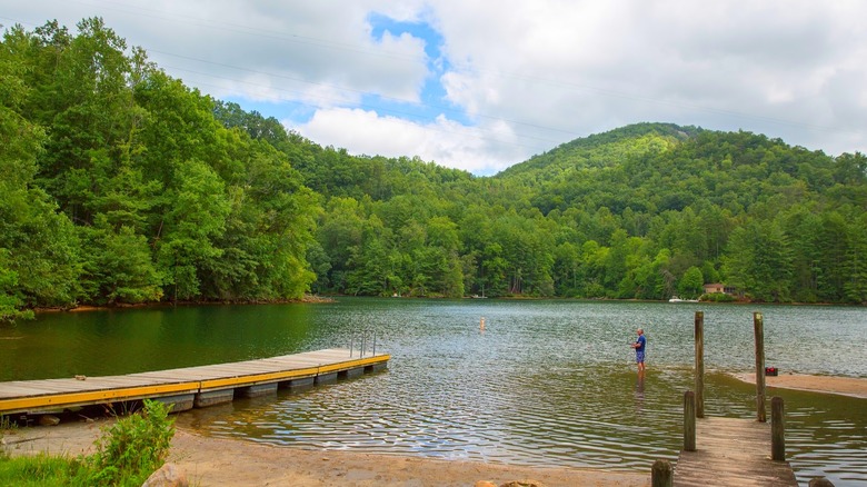 A man fishing at Cedar Cliff Lake, North Carolina