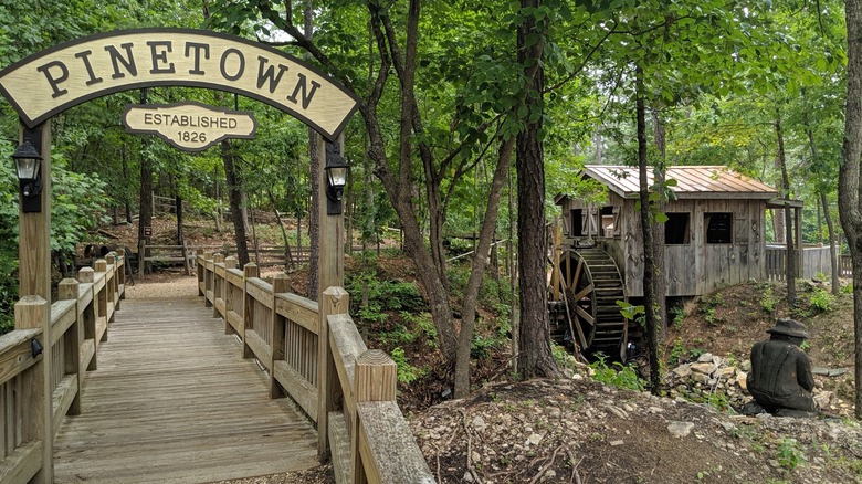 Remnants of a gold mining site with a sign at Pine Mountain Gold Museum at Stockmar Park, Villa Rica, Georgia