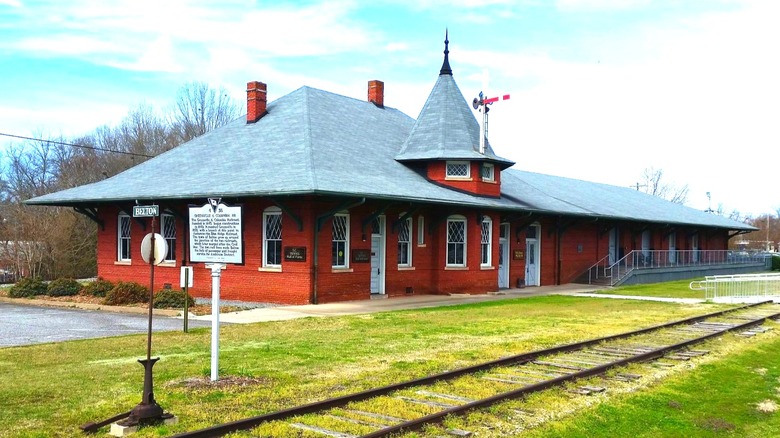 Small red brick railroad depot building in Belton, South Carolina