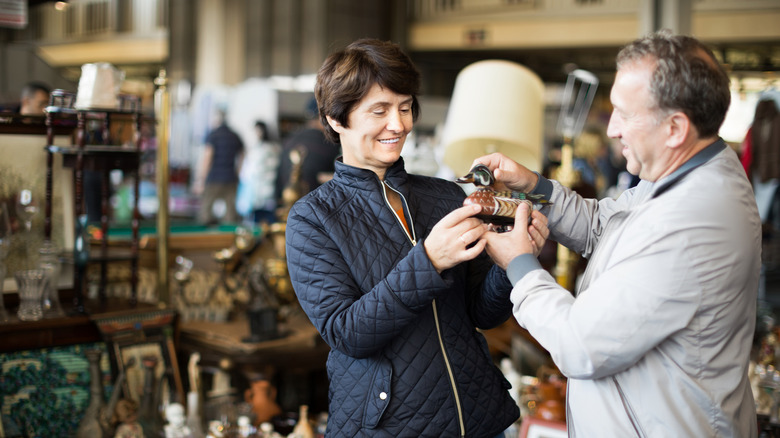 Couple browsing antiques