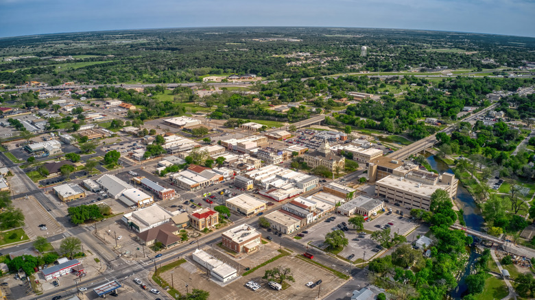 An aerial view of the city of Belton surrounded by trees in the middle of Bell County, Texas