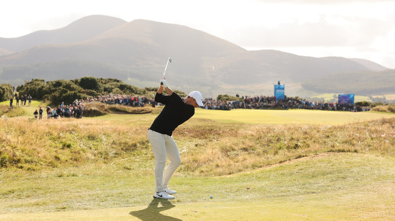 Rory McIlroy hitting a shot at Royal County Down