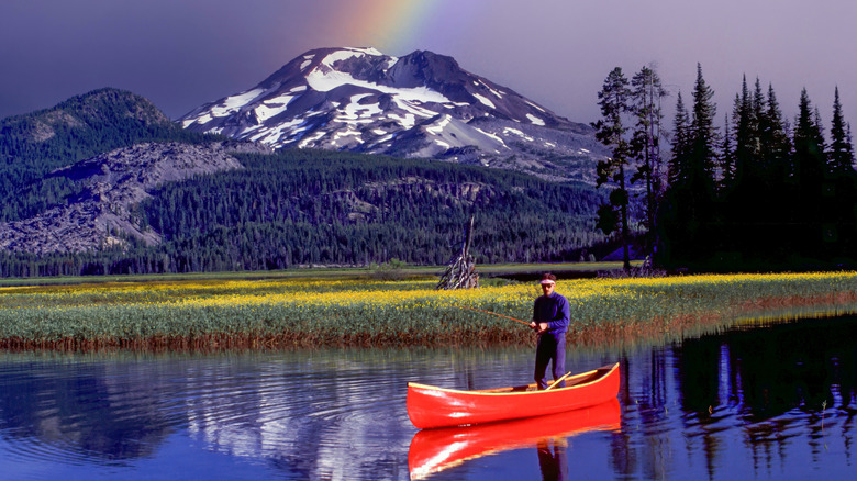 Man fishing from a canoe in Sparks Lake