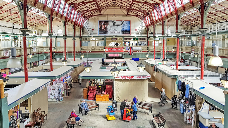 Interior of Accrington Market Hall full of shop stalls