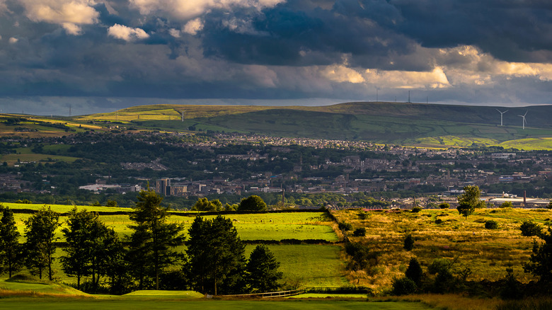 Clouds over a farms and hills in the county of Lancashire, England, UK