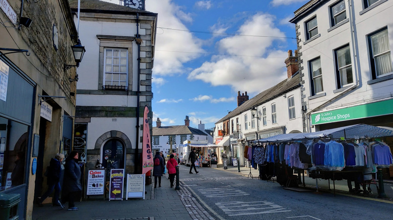 Shops and market stalls on High Street in Garstang, England
