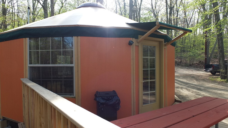 A close-up on a yurt during a sunny day at Sutton Falls Camping Area, Massachusetts