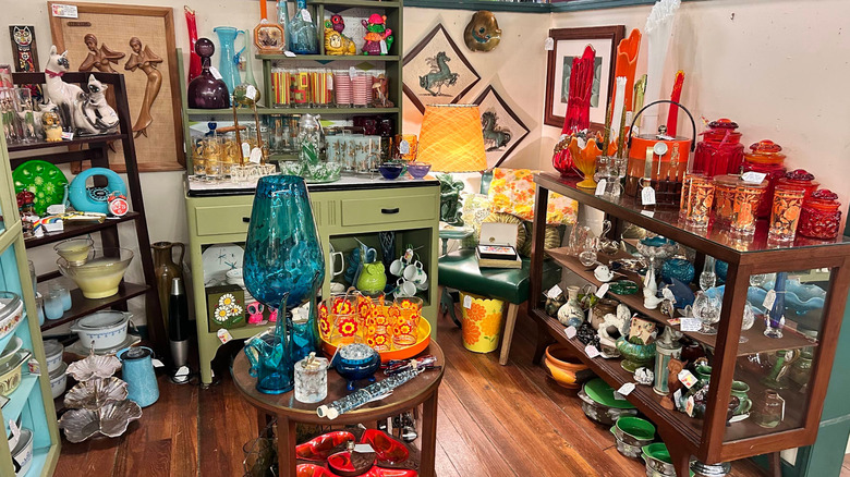 A rainbow of antiques line the shelves at Antiques Marketplace in Putnam, Connecticut