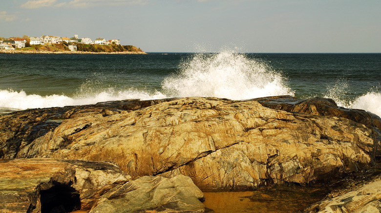 Waves crash against the rocky jetty at Hampton Beach, New Hampshire