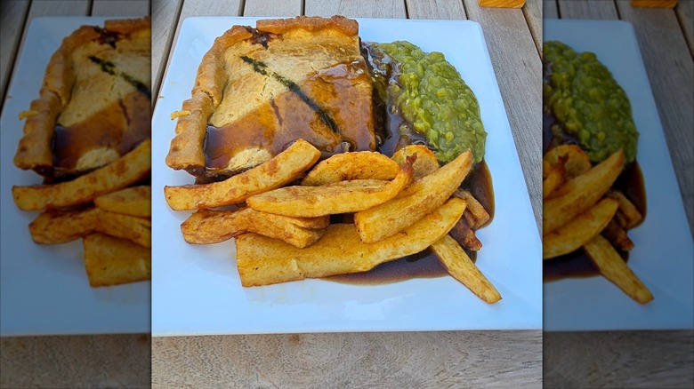 Pie, chips, mushy peas, and gravy at the Piebald Inn in Yorkshire, England