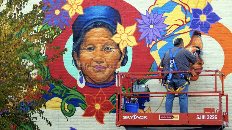A mural being painted in Urbana-Champaign