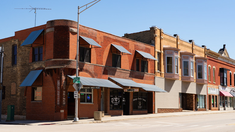 The rustic buildings along a quiet street on a bright, clear day in Marengo, IL