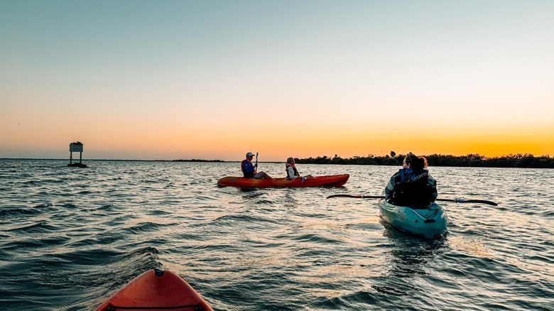 Kayakers enjoying the Haulover Canal in Mims, Florida