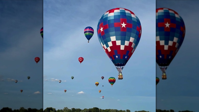 Colorful hot air balloons flying over Ashland, Ohio, during Ashland BalloonFest