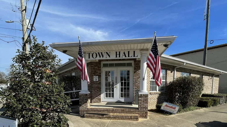The Notasulga town hall with the American flag on both sides.