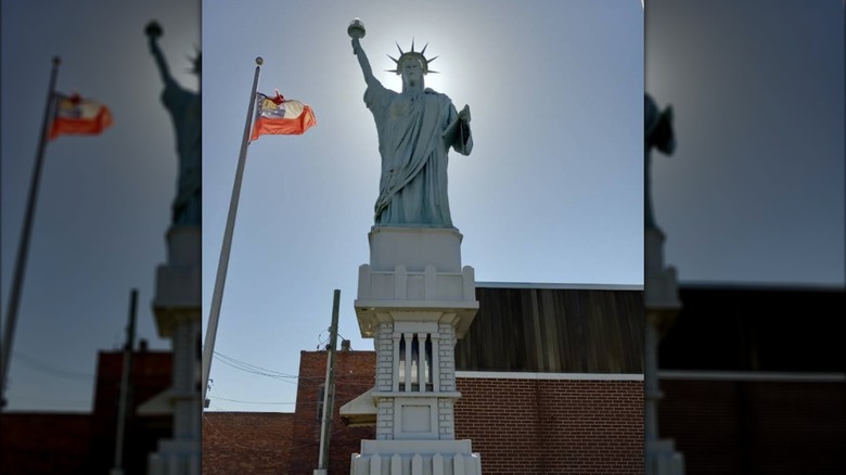 Sunlight behind a replica of the Statue of Liberty in McRae-Helena, Georgia