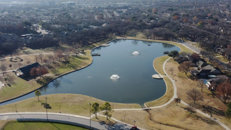A birds eye view of Bedford Texas from Boys Ranch shows a lake and residential area