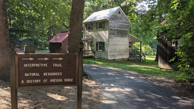 Sign for interpretive trail by an old miner's house in Oregon Ridge Nature Center, Maryland