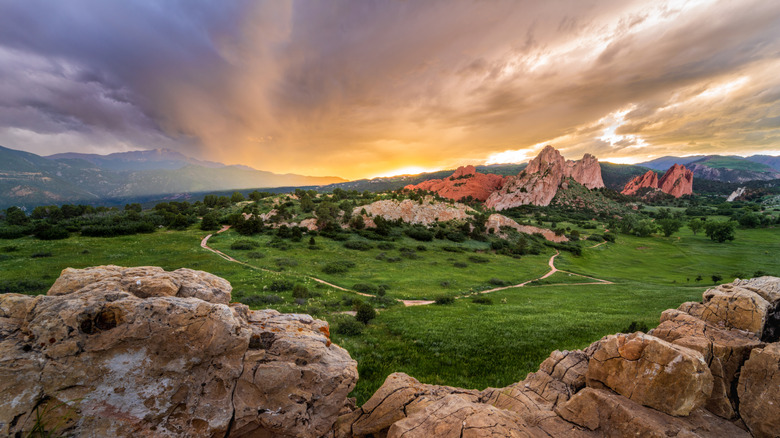 A ridge overlooking the beautiful towering pillars of Garden of the Gods at sunset